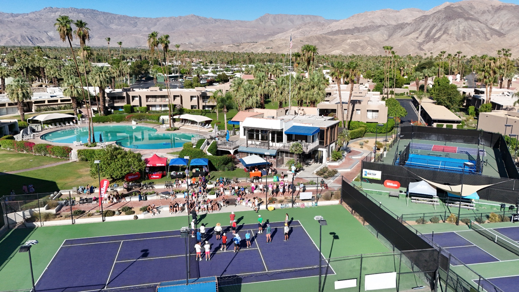 Courtside social gathering at the resort racquet club