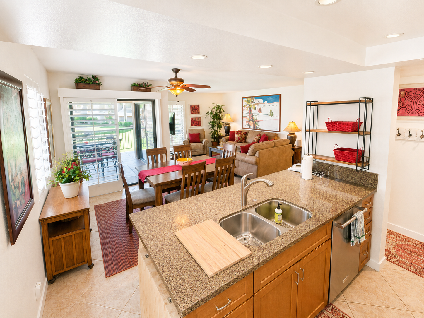 Kitchen with breakfast bar overlooking the dining and living spaces