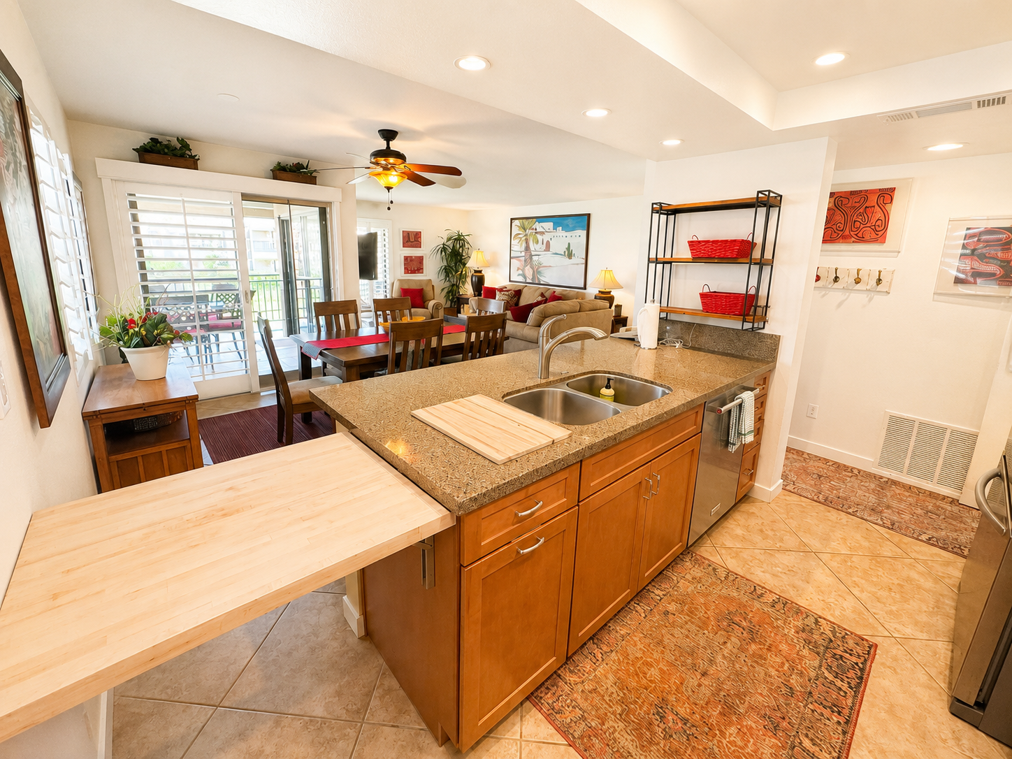 Kitchen island opening into the dining and living area